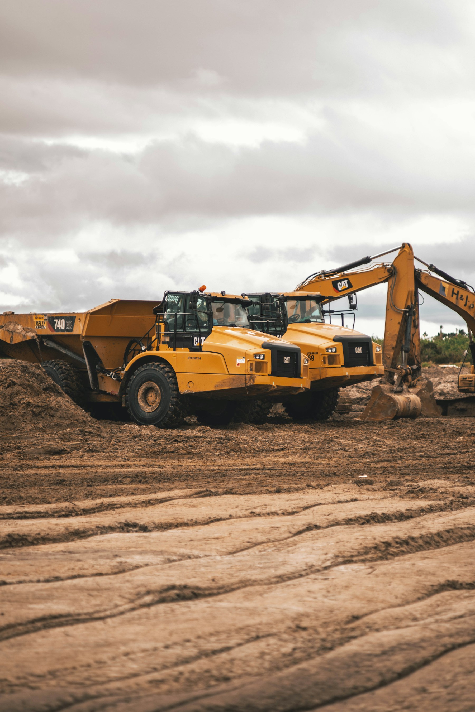 Heavy construction equipment positioned on an active worksite